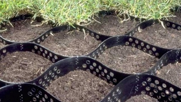 Geoweb is a plastic structure packed with gravel and bark.